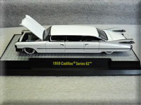 Mini-Motors Exclusive Pearl White Mad Cow 1959 Cadillac Series 62